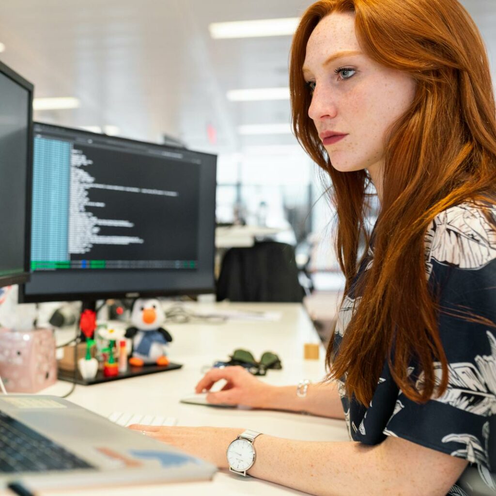 Woman Coding on Computer